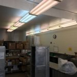 A poorly-lit commercial kitchen